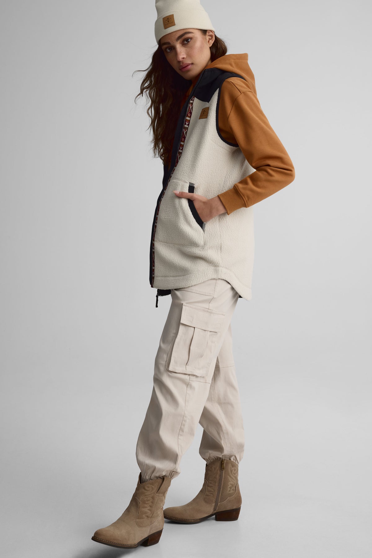 Veste longue sans manches en sherpa pour femme