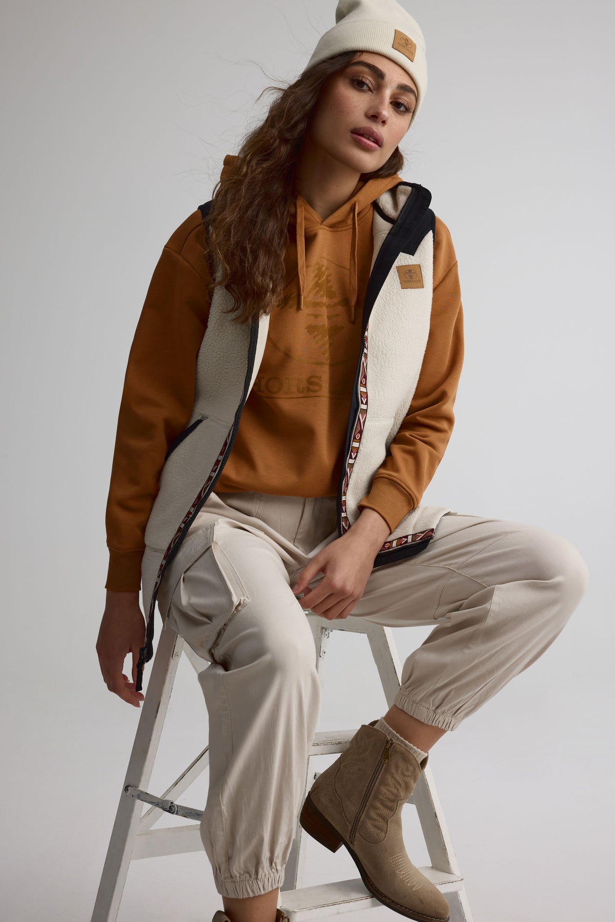 Veste longue sans manches en sherpa pour femme